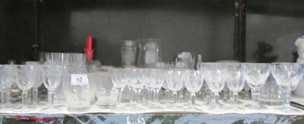 A shelf of drinking glasses