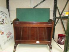 A magazine rack and a card table