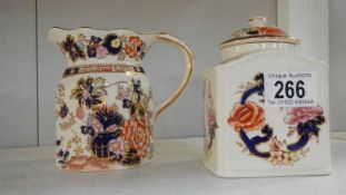 A Mason's jug and tea caddy