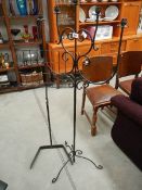 A metal candleholder and music stand