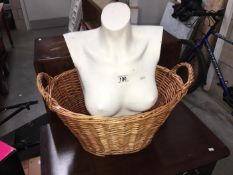 A Mannequin bust and a wicker basket