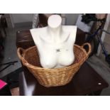 A Mannequin bust and a wicker basket