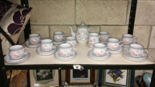 A Denby tea set with setting for 10