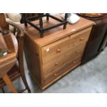 A modern pine chest of drawers