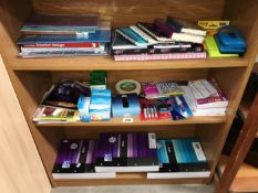 3 shelves of stationary items