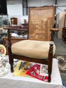 A 1930's cane backed hall chair