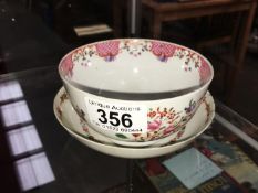 A hand painted cup & saucer A/F
