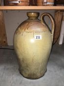 A large old earthenware jug