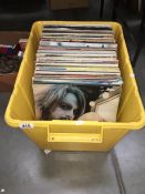 A box of LP records including Lennon, Pete Townsend,