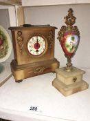 A mantel clock & 1 other item