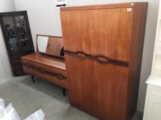 A retro wardrobe & retro sideboard with mirror back