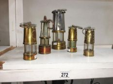 5 ornamental miners lamps