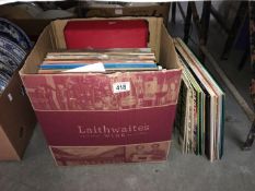 A box of LP records including Simon & Garfunkel, Johny Mathis etc.