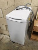 A Hotpoint WT2500 upright washing machine