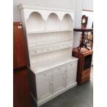 A white painted kitchen dresser