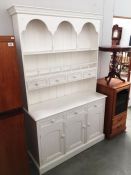 A white painted kitchen dresser