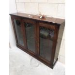 A 3 door glazed display cabinet top