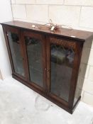 A 3 door glazed display cabinet top