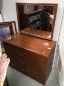 A 3 drawer mirror back chest