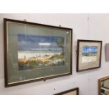 A pair of framed and glazed beach scenes