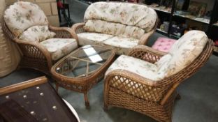 A good 4 piece cane furniture set