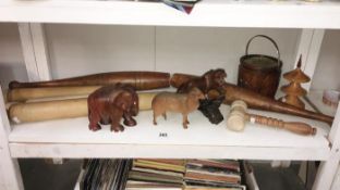 A quantity of wooden items including animal figures, rolling pins & gavel etc.