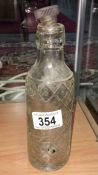 A vintage Cottam & Wright Lincoln table water bottle