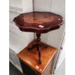 A tripod occasional table
