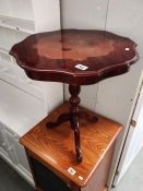 A tripod occasional table