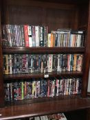 Over 130 DVD's and a quantity of CD's