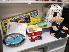 A Fisher Price record player matchbox rapid shot slam set and a bear factory teddy bear etc.