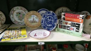 A quantity of books on antiques & a quantity of plates