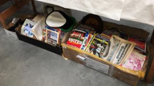 2 big boxes of football game magazines & papers & a smaller box of medals etc.