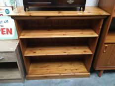 A 3 shelf pine book case