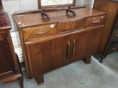 A 3 drawer over 2 door cabinet