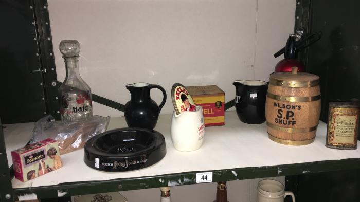 A quantity of tobacco & breweriana including water jugs, soda syphon,