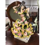 A porcelain dancer figure signed & marked Italy