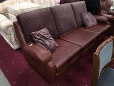 A 3 seater leather settee