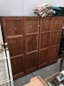 A pair of oak wardrobes