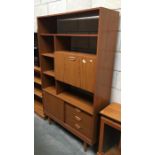 A retro display cabinet with drawers & shelves