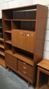 A retro display cabinet with drawers & shelves
