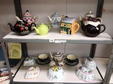 A mixed lot of teapots & quantity of Franklin Mint 'Le cordon bleu' moulds