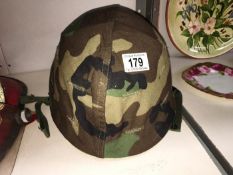 A ground troops helmet with liner