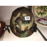 A ground troops helmet with liner