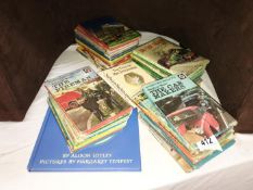 A collection of children's books including Ladybird Well Loved Tales, Alison Uttley etc.