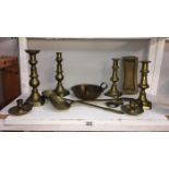 A quantity of Victorian candlesticks etc.