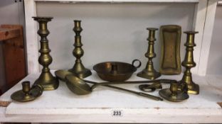 A quantity of Victorian candlesticks etc.