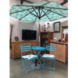 A blue metal patio set with parasol & extra base