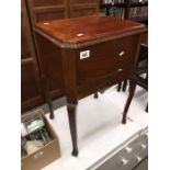 An Edwardian oak free standing sewing box A/F with contents