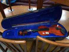 A violin and bow in case